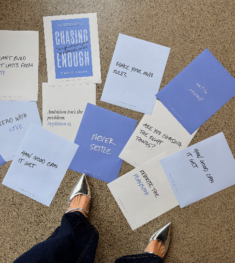 Chasing Enough branded cards and prompts spread on a surface